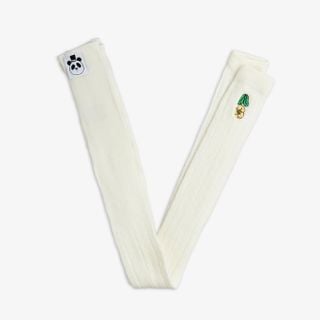 White pointelle leggings featuring a small yellow Viola embroidery and a signature panda logo tag.