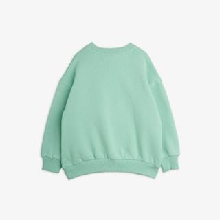 Mint green organic cotton sweatshirt with ribbed trims, shown from the back, part of Velvet worms observations collection.