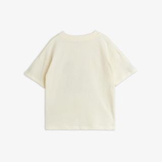 Off-white short-sleeved T-shirt with a ribbed crew neck, shown from the back.