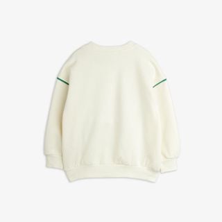 Off-white sweatshirt featuring a crew neck, ribbed trims, and green piping detail across the shoulders, shown from the back.