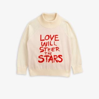 Off-white knit sweater featuring a high collar and red text print that reads Love Will Steer The Stars on the front.