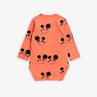 Red organic cotton long sleeve bodysuit featuring an all-over Ritzratz print.