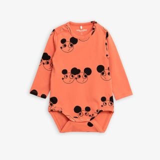 Red long sleeve bodysuit featuring a black Ritzratz print and snap buttons.