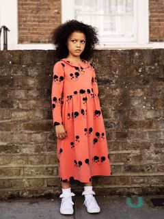 Red long-sleeve dress featuring a rounded collar and an all-over Ritzratz print.