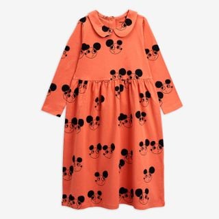 Red dress featuring a rounded collar and black Ritzratz print, long sleeves, and a gathered waist.