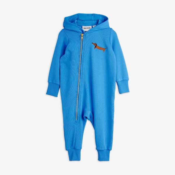 Blue baby onesie featuring a hood, an asymmetrical zipper, and an embroidered dog on the chest.
