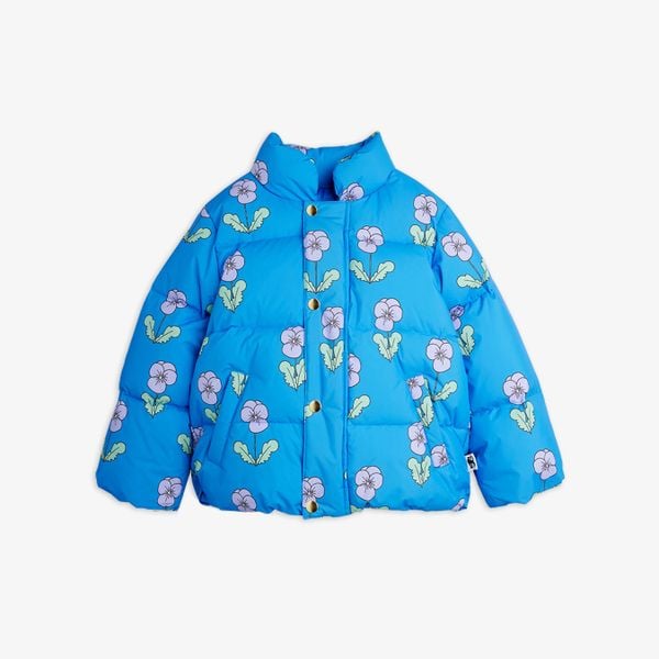 Blue puffer jacket featuring an all-over floral print and gold snap buttons.