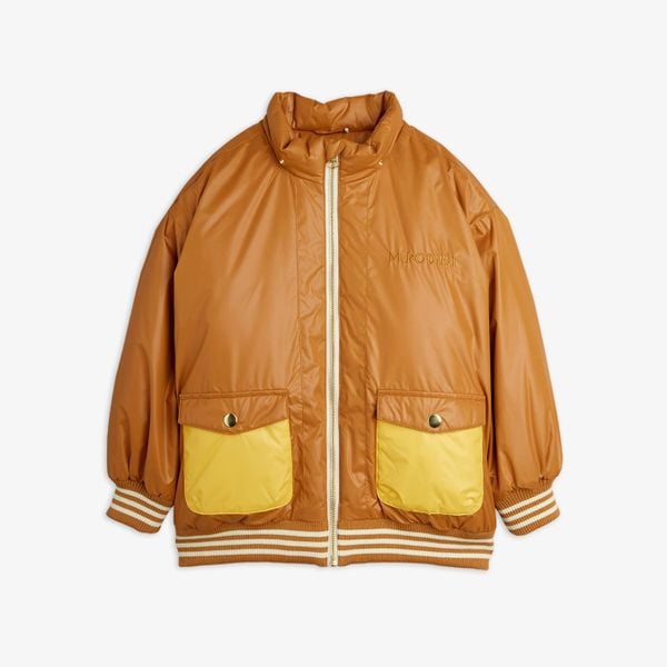 Beige puffer jacket featuring yellow contrast front pockets, striped ribbed trims, and a white zipper closure.