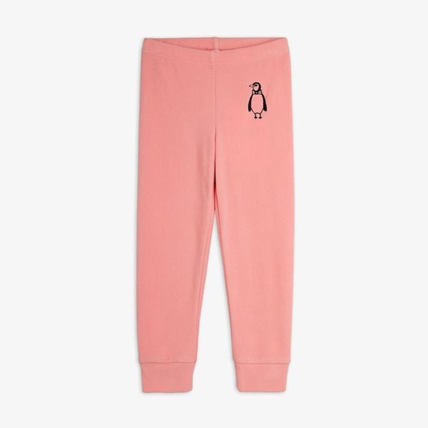 Pink trousers featuring a penguin embroidery on the hip, elastic waist, and cuffed legs.