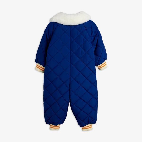 Blue quilted baby overall with a white faux-fur collar and striped ribbed cuffs, shown from the back.
