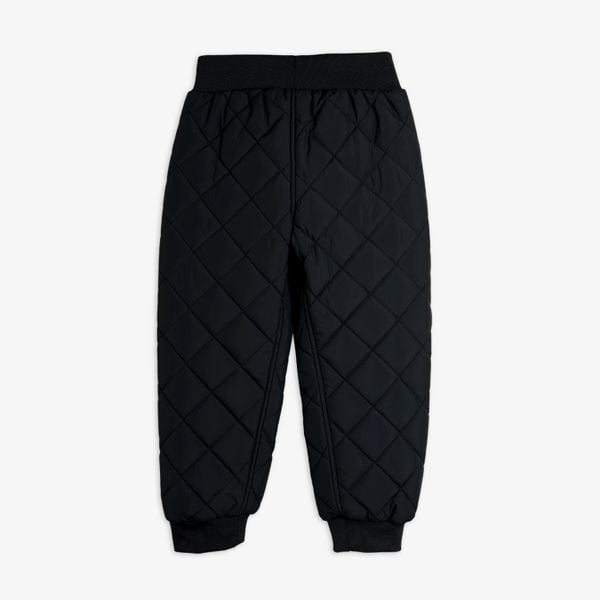 Black diamond-quilted outerwear trousers with an elasticated waist, shown from the back.