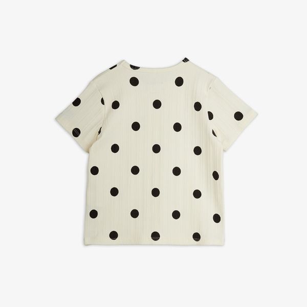 Off-white short-sleeved top featuring a black Dots print, shown from the back.