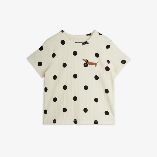 Off-white short-sleeved top with a black dot pattern and an embroidered dachshund dog on the chest.