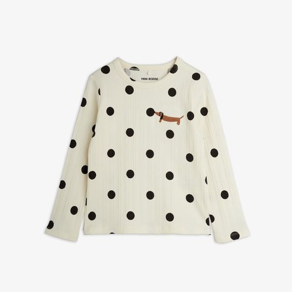 Off-white long-sleeved top featuring a black dot pattern and a dachshund dog motif on the chest.