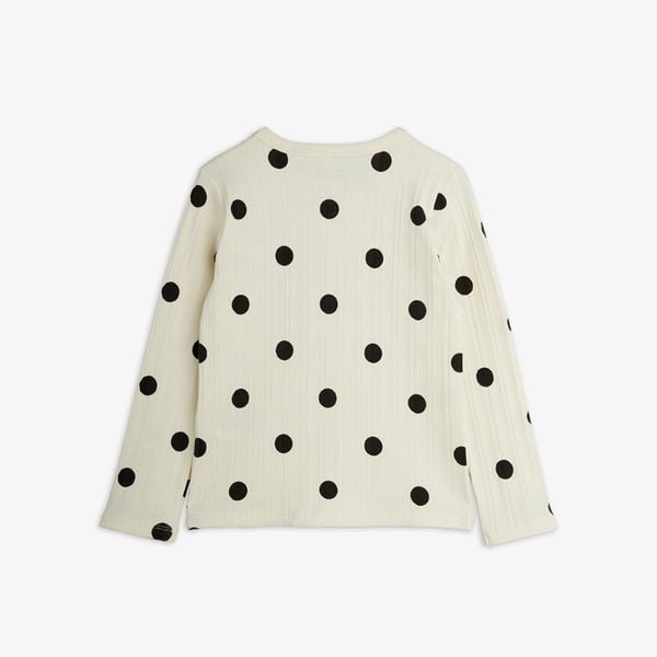 Off-white long-sleeved top with a black Dots print, featuring a ribbed texture and shown from the back.
