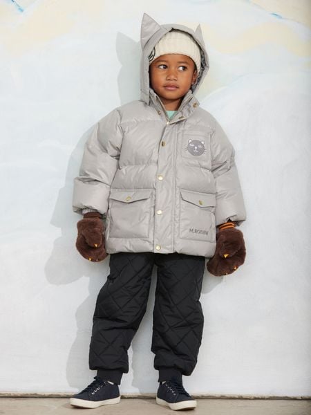 Grey puffer jacket featuring a cat face patch, front flap pockets, and snap buttons.