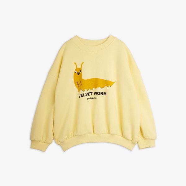 Yellow sweatshirt featuring a Velvet worm print with text and ribbed trims.