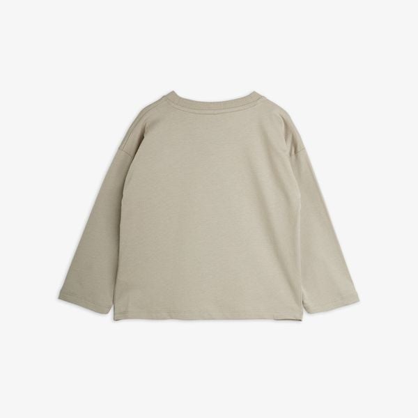 Grey long-sleeved top featuring dropped shoulders and a relaxed fit, shown from the back.