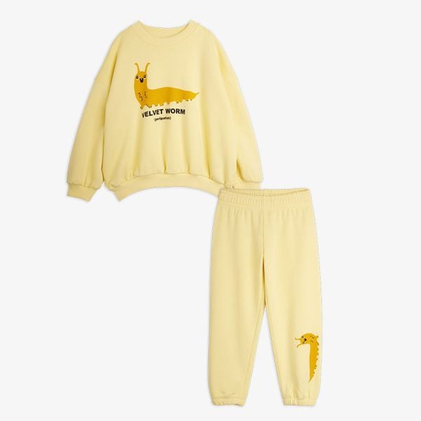 Yellow sweat set featuring a Velvet worm print on the sweatshirt and leg.