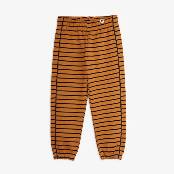 Brown striped sweatpants with an elasticated waist, cuffs, and dark piping along the sides.