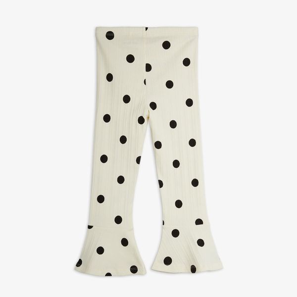 Off-white flared trousers with a black dots pattern, shown from the back.
