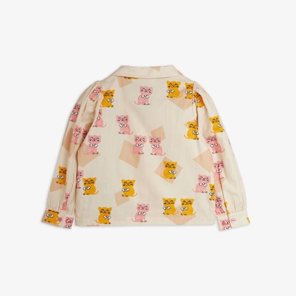 Cream woven blouse featuring an all-over Kittens print, gathered puff sleeves, and a camp collar, shown from the back.