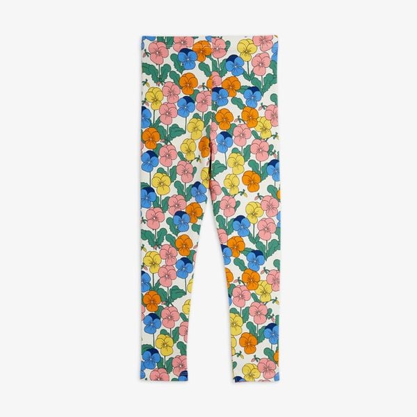 Leggings featuring an all-over Viola flower pattern in blue, pink, orange, and yellow on an off-white background.