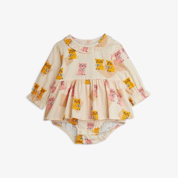Cream long-sleeved bodysuit featuring an orange and pink Kittens print and a ruffled collar.