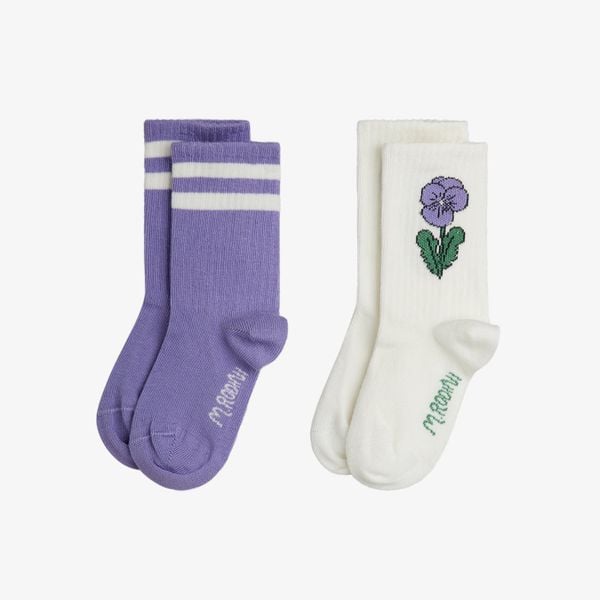 Purple socks with white stripes and off-white socks with a purple Viola flower print and ribbed shafts.