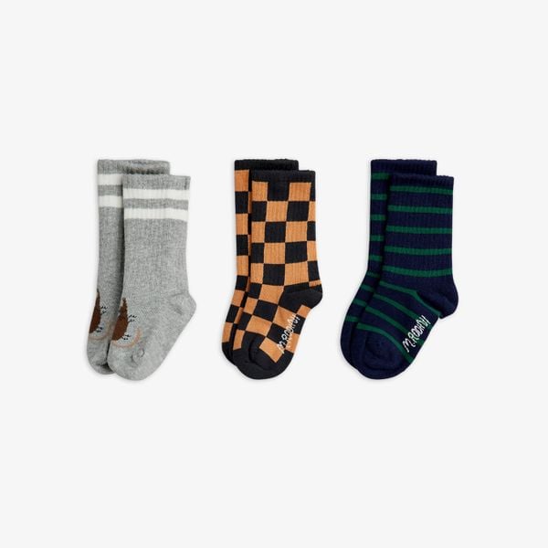 Chess check, striped, and animal motif organic cotton socks in a 3-pack with ribbed cuffs and logo soles.