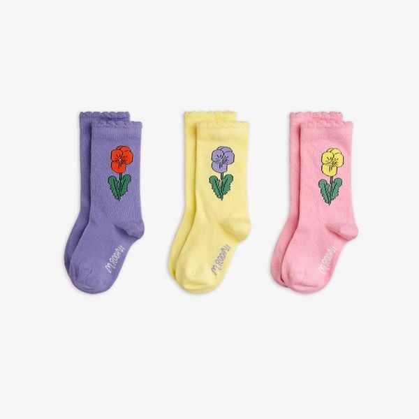Purple, yellow, and pink organic cotton socks in a 3-pack, featuring Violas flower intarsia and scalloped edges.
