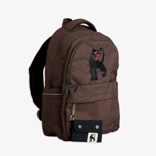 Brown school backpack featuring an embroidered panther motif and a detachable black mini bag.