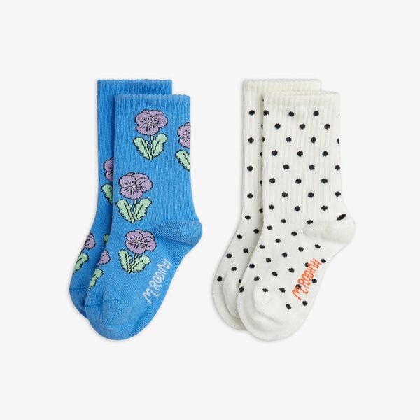 Organic cotton 2-pack socks featuring a blue pair with purple Viola prints and a white pair with black dots.