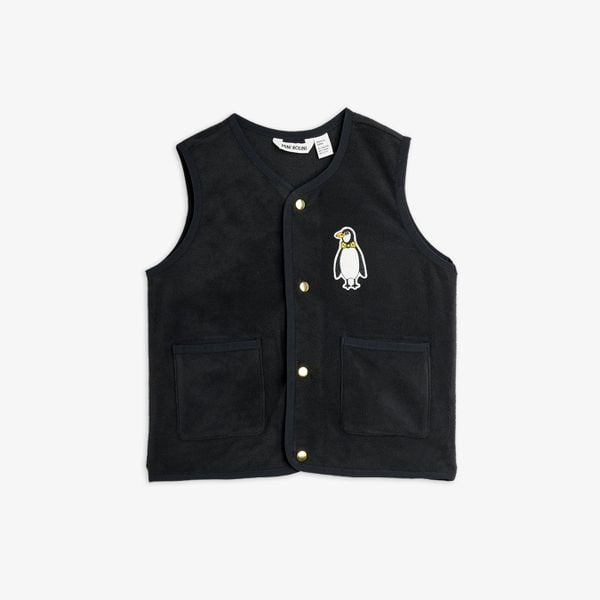Black microfleece vest featuring a penguin patch, gold snap buttons and two front pockets.
