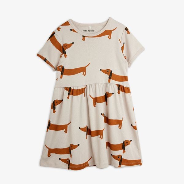 Grey short-sleeved dress featuring a repeating brown dachshund Dog print and a gathered waist.