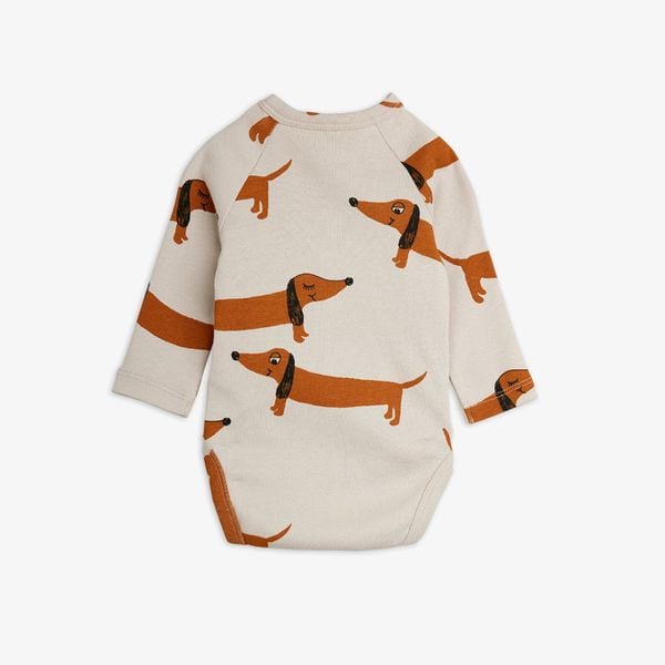 Grey long-sleeved bodysuit featuring a repeating brown dachshund dog pattern.