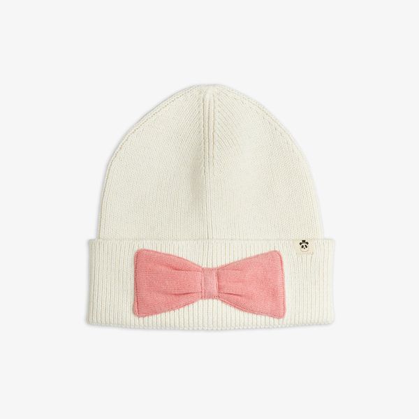Off-white knitted beanie with a folded hem, pink bow, and small panda logo tab.