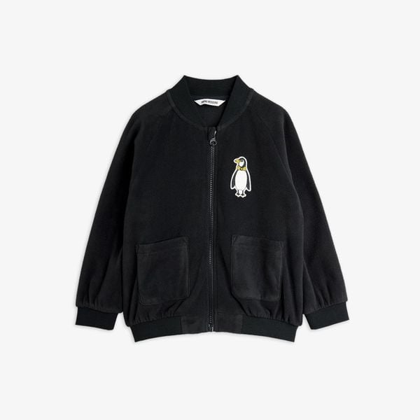 Black microfleece jacket featuring a penguin patch, zipper closure, front pockets, and ribbed trims.