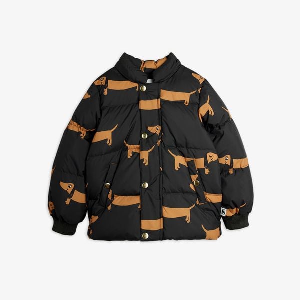 Black padded jacket with a brown Dog print, featuring gold snap buttons and front pockets.