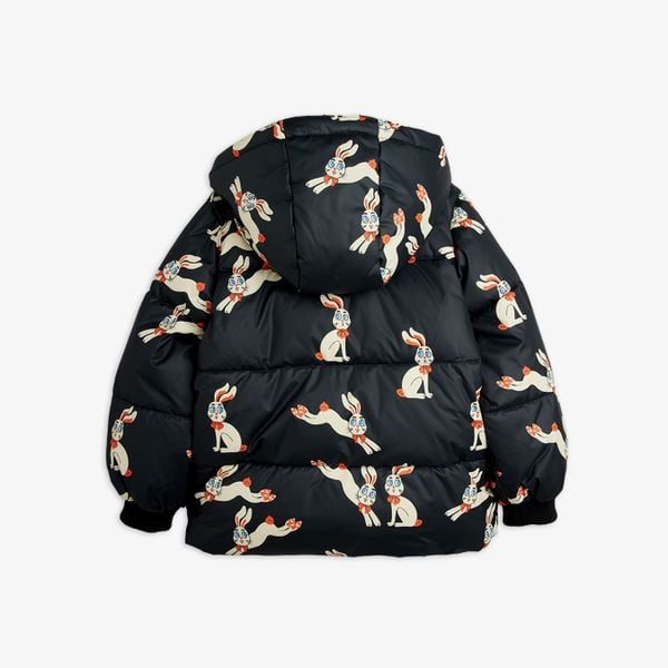 Black hooded puffer jacket featuring a white Rabbits print and black ribbed cuffs, shown from the back.