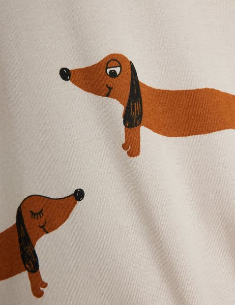 Brown dachshund dog print on a light grey background, featuring black ears and nose details.
