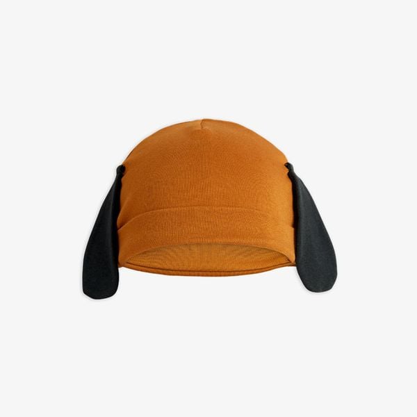 Brown baby beanie with a fold-up brim and attached black floppy dog ears.