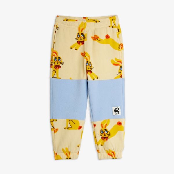 Yellow fleece trousers with a Rabbits print, light blue contrast knee panels and elasticated cuffs.