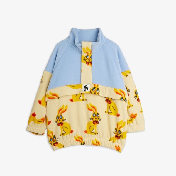 Yellow and blue fleece half-zip sweater featuring a Rabbits print, high collar, and elasticated trims.