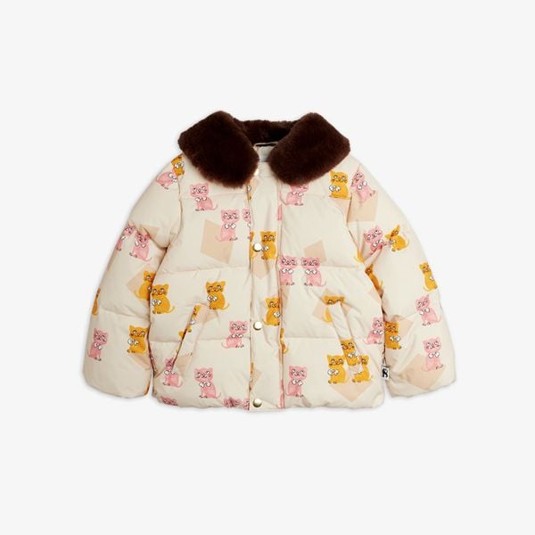 Cream puffer jacket with a pink and orange Kittens print, featuring a dark brown faux fur collar and gold snap buttons.