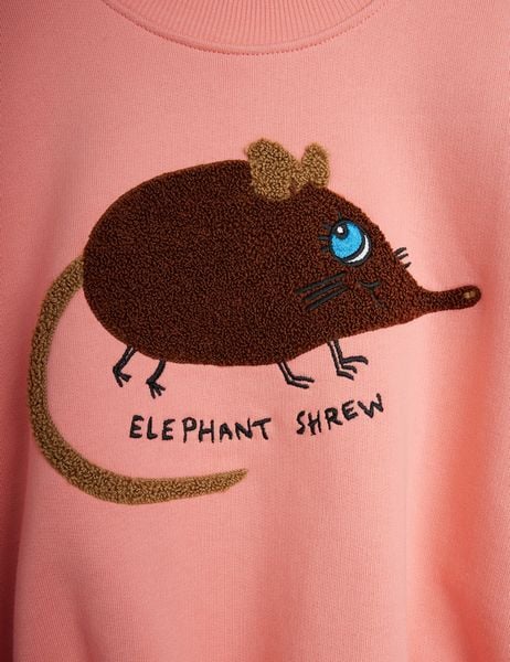Brown Elephant shrew chenille application on a pink sweatshirt with embroidered text in a close-up.
