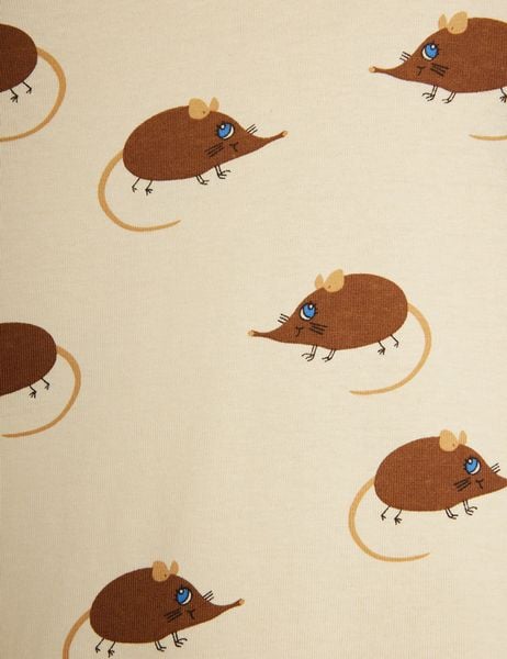 Close-up of beige fabric featuring a repeating brown Elephant shrew print with blue eyes.