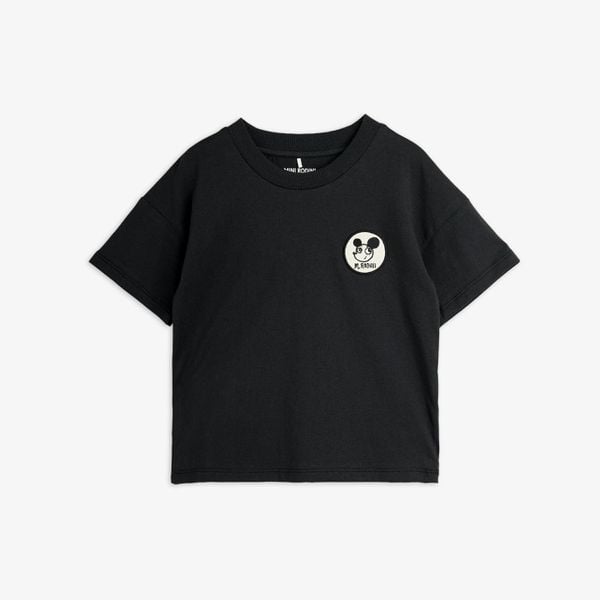 Black T-shirt featuring a Ritzratz patch on the chest, dropped shoulders, and a ribbed crew neck.