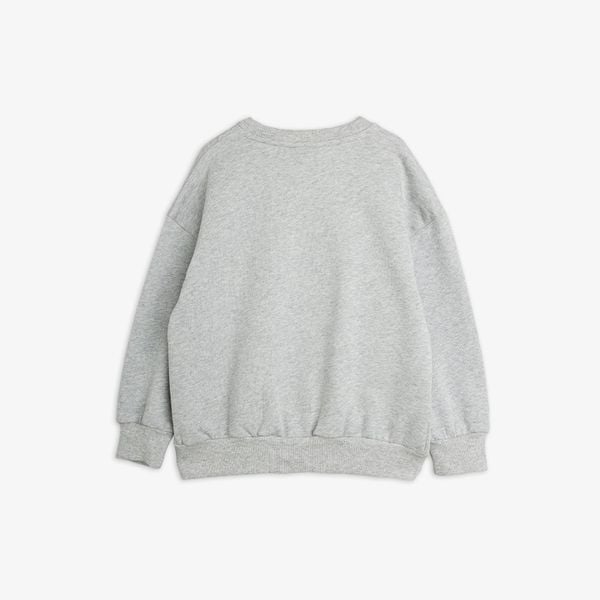 Grey melange sweatshirt seen from the back featuring dropped shoulders and ribbed trims.