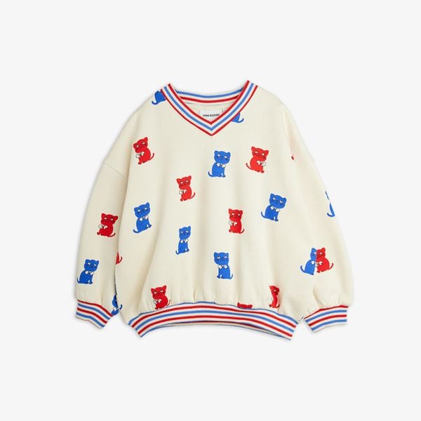 Off-white sweatshirt with red and blue Kittens print, striped V-neck collar, and ribbed trims.
